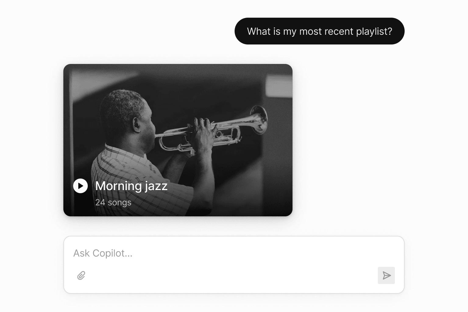 An example of the AI rendering a custom chat component instead of a message. It's a playlist component, with a play button.